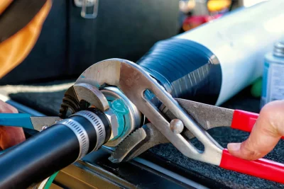 Pipe repair service using professional plumbing tools in Homestead, Florida